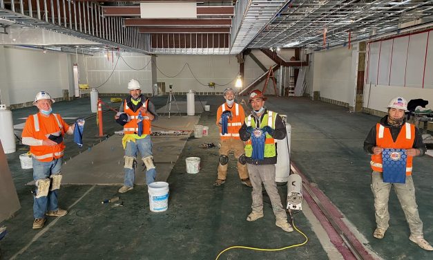 Members working on Rinaldi Tile & Marble job